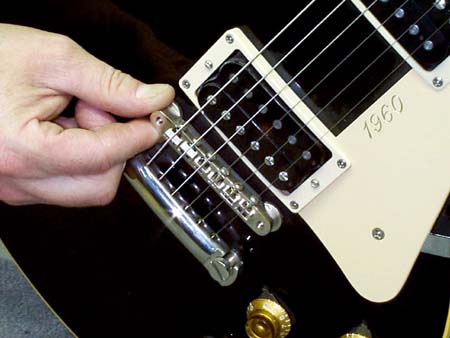 Gibson Guitars - Basic Guitar Setup - Saddle